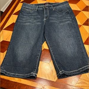 Royalty denim shorts size 10 with white embroidery on pockets